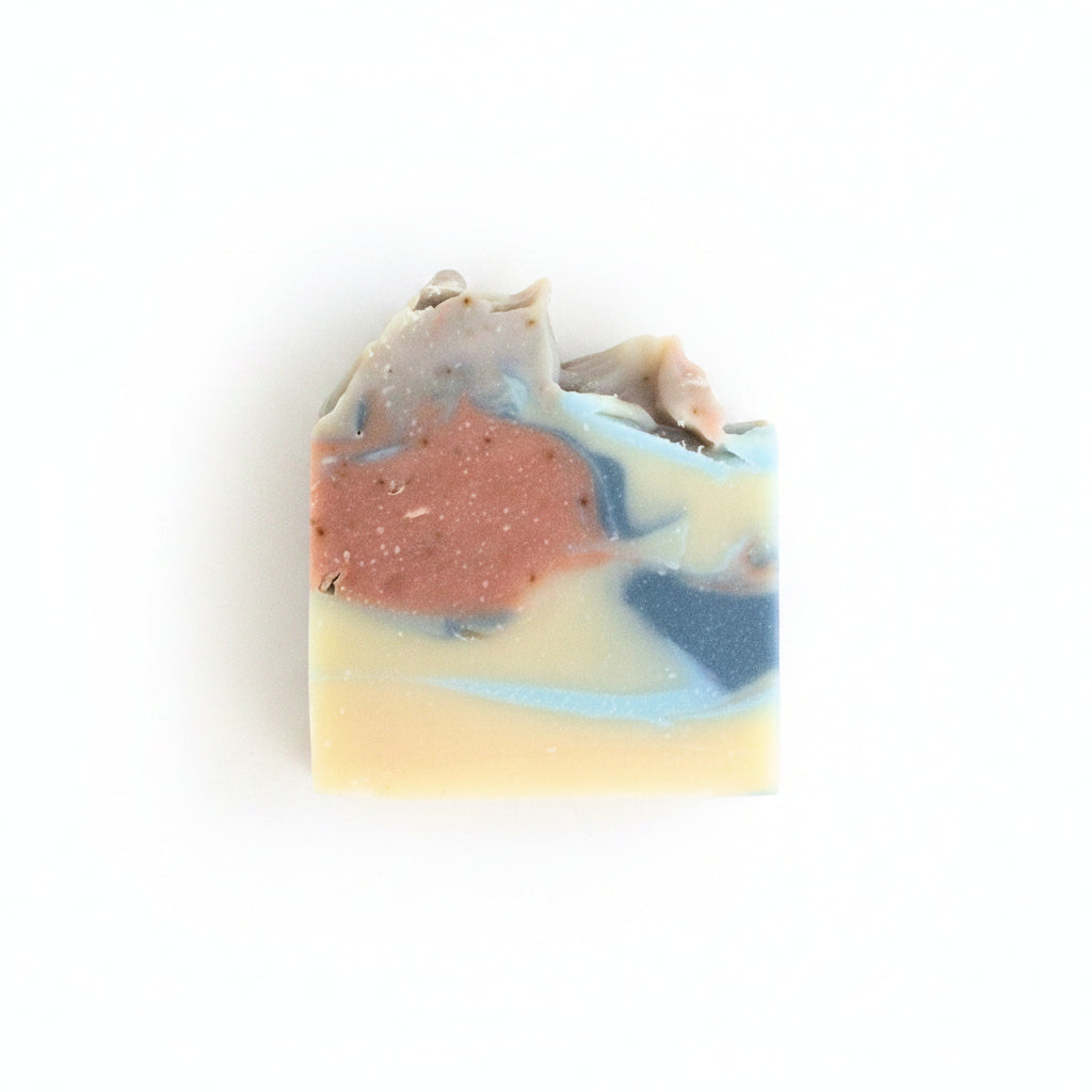 Summer Swirl soap bar with swirled colors of pink blue and cream on white background