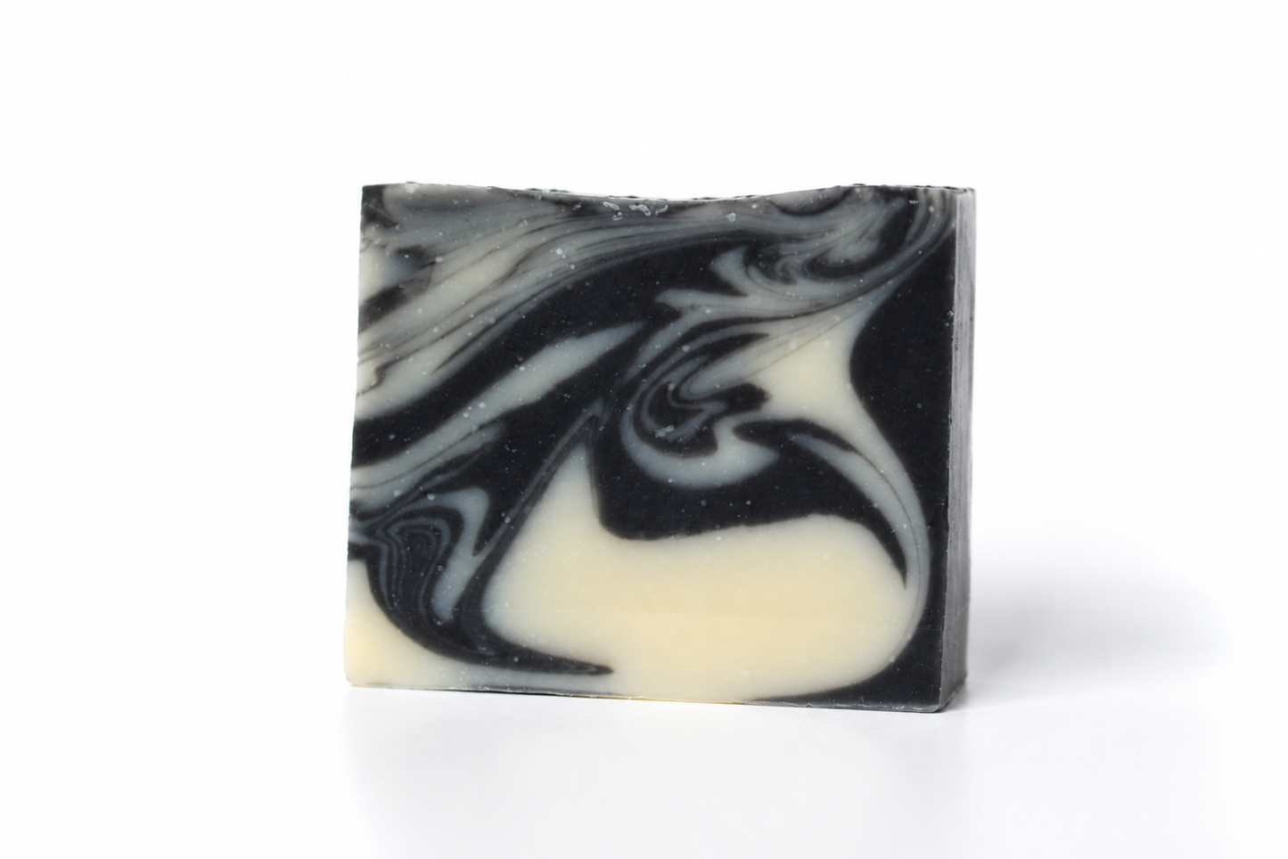 white and black swirled color soap