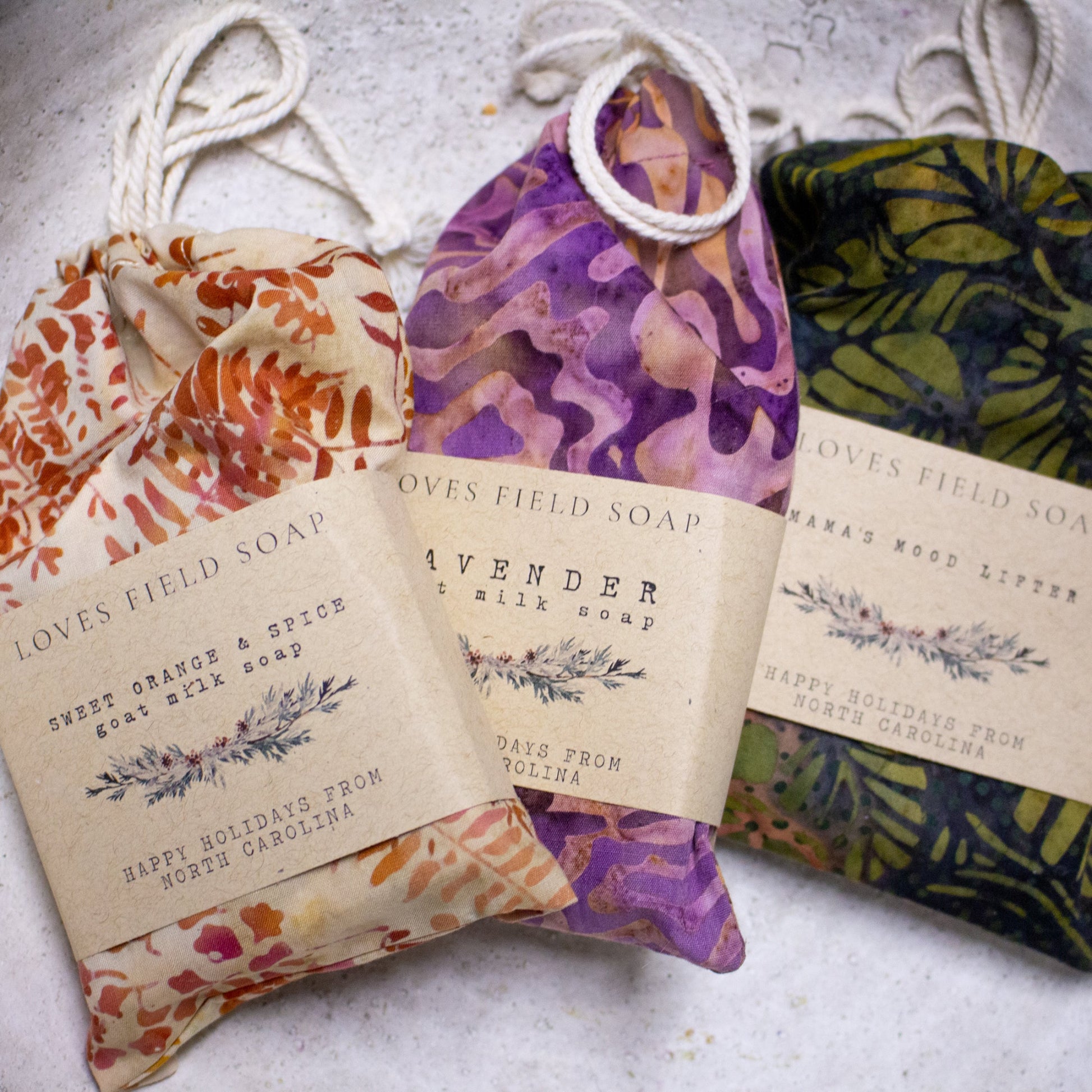 trio handmade soap gift set with lavender goat milk, orange spice oatmeal, and mood lifter soap bars